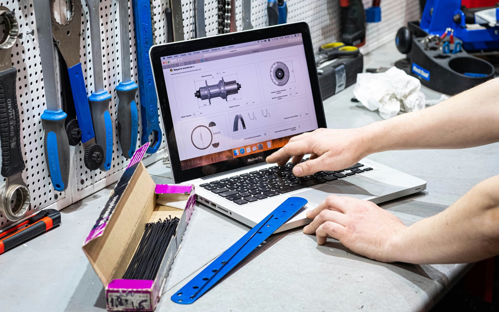 Manufacturing employee using equipment and information, human-first